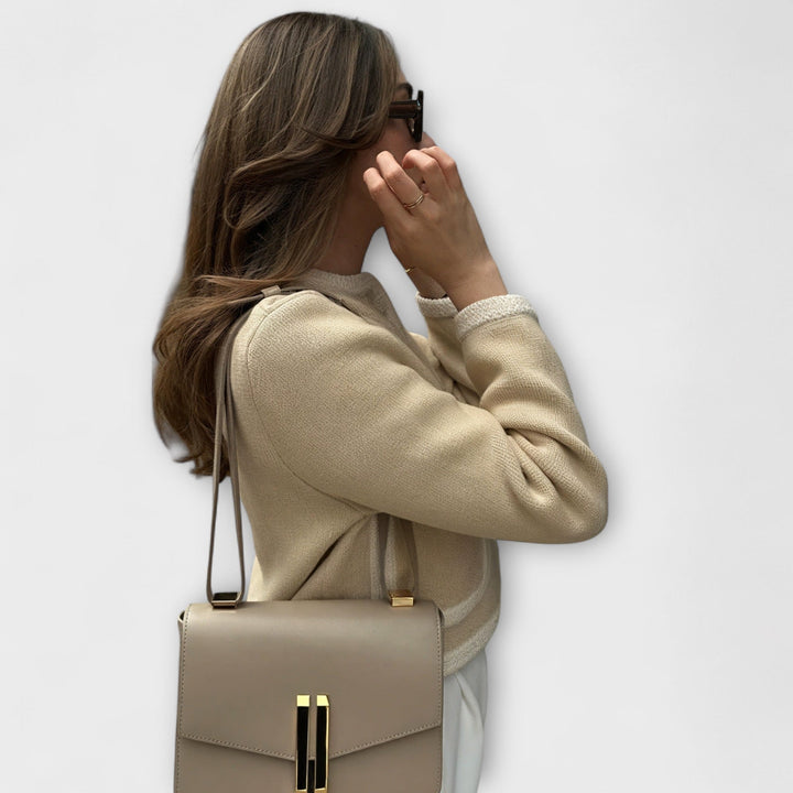 Classic cardigan with decorative pockets